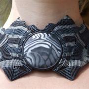 Collier Batman gros plan