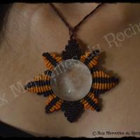 Pendentif soleil cristal de roche porte
